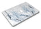 Blue_and_Black_Grunge_Over_White_Marble_Surface_-_13_MacBook_Air_-_V2.jpg