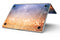 Blue_and_Orange_Scratched_Surface_with_Glowing_Gold_-_13_MacBook_Pro_-_V8.jpg