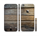 The Uneven Dark Wooden Planks Sectioned Skin Series for the Apple iPhone 6/6s