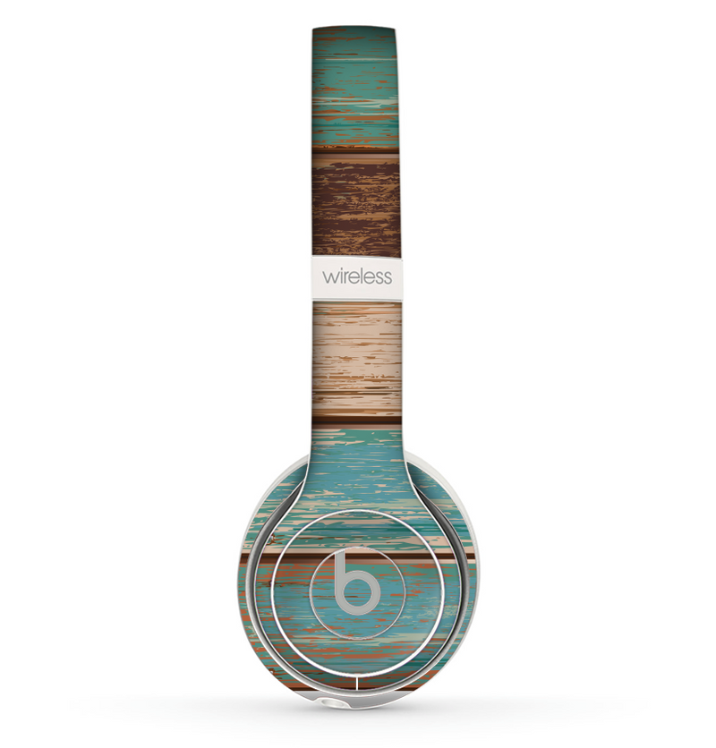 The Wooden Planks with Chipped Green and Brown Paint Skin Set for the Beats by Dre Solo 2 Wireless Headphones