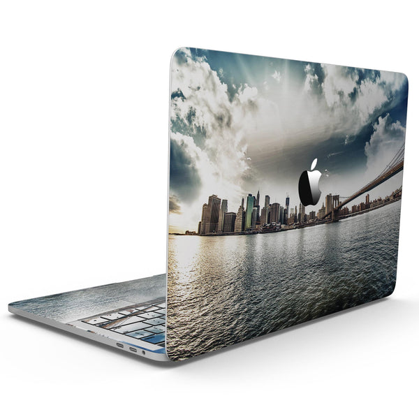 MacBook Pro with Touch Bar Skin Kit - Vivid_Cloudy_Sky_Over_The_City_Skyline-MacBook_13_Touch_V9.jpg?