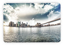 Vivid_Cloudy_Sky_Over_The_City_Skyline_-_13_MacBook_Pro_-_V7.jpg