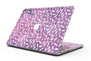 White_Flower_Pedals_Over_Purple_Grunge_Surface_-_13_MacBook_Pro_-_V1.jpg
